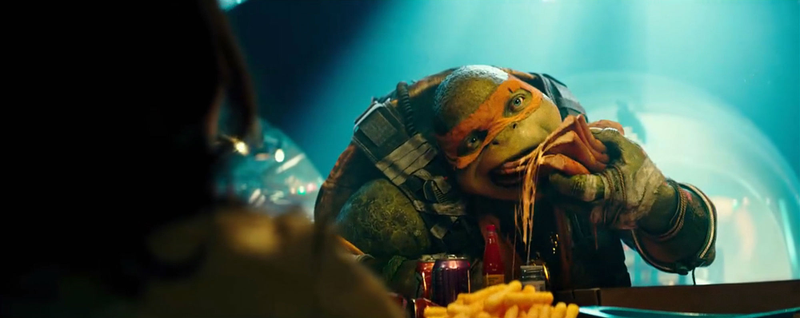 Michaelangelo eats a lot of pizza in Out of the Shadows, because that’s what Michaelangleo does.
